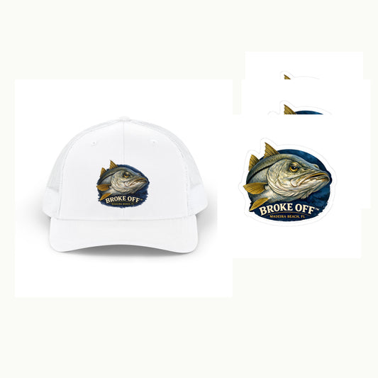 White BROKE OFF™ snook trucker next to a stack of snook stickers. Snook on a navy circle. BROKE OFF™. Madeira Beach, FL.